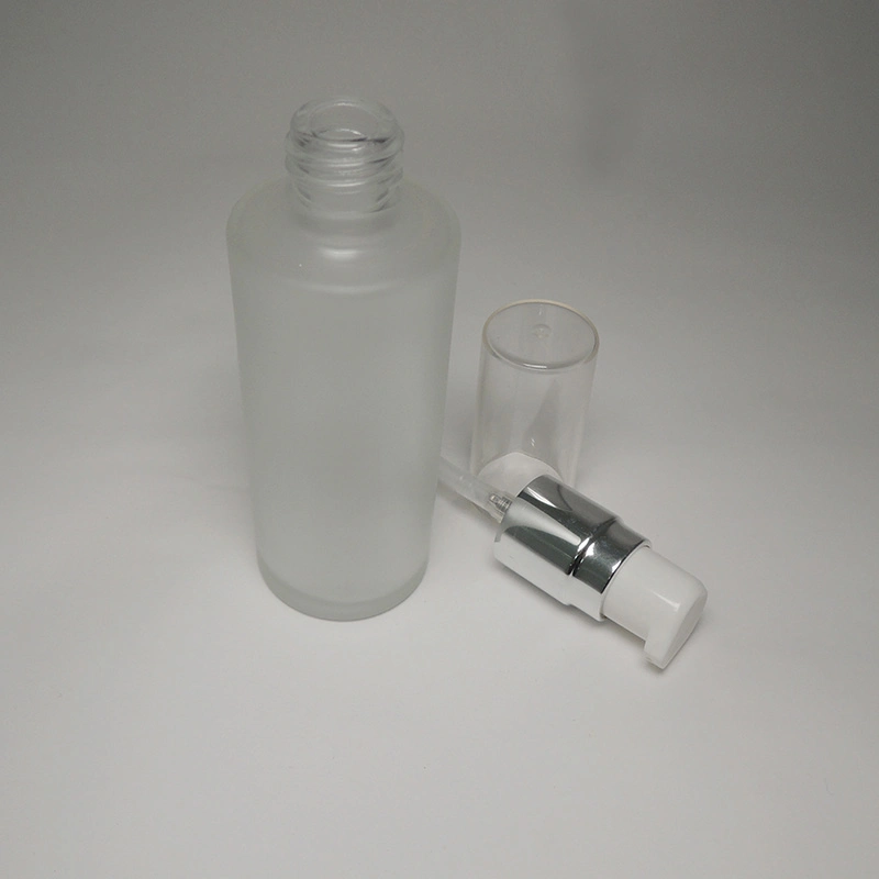 Medium Size Skincare Cosmetic Packaging Empty 50ml Cylinder Shape Glass Bottle Matte Finish with Cream/Lotion Pump and Oversize Cap